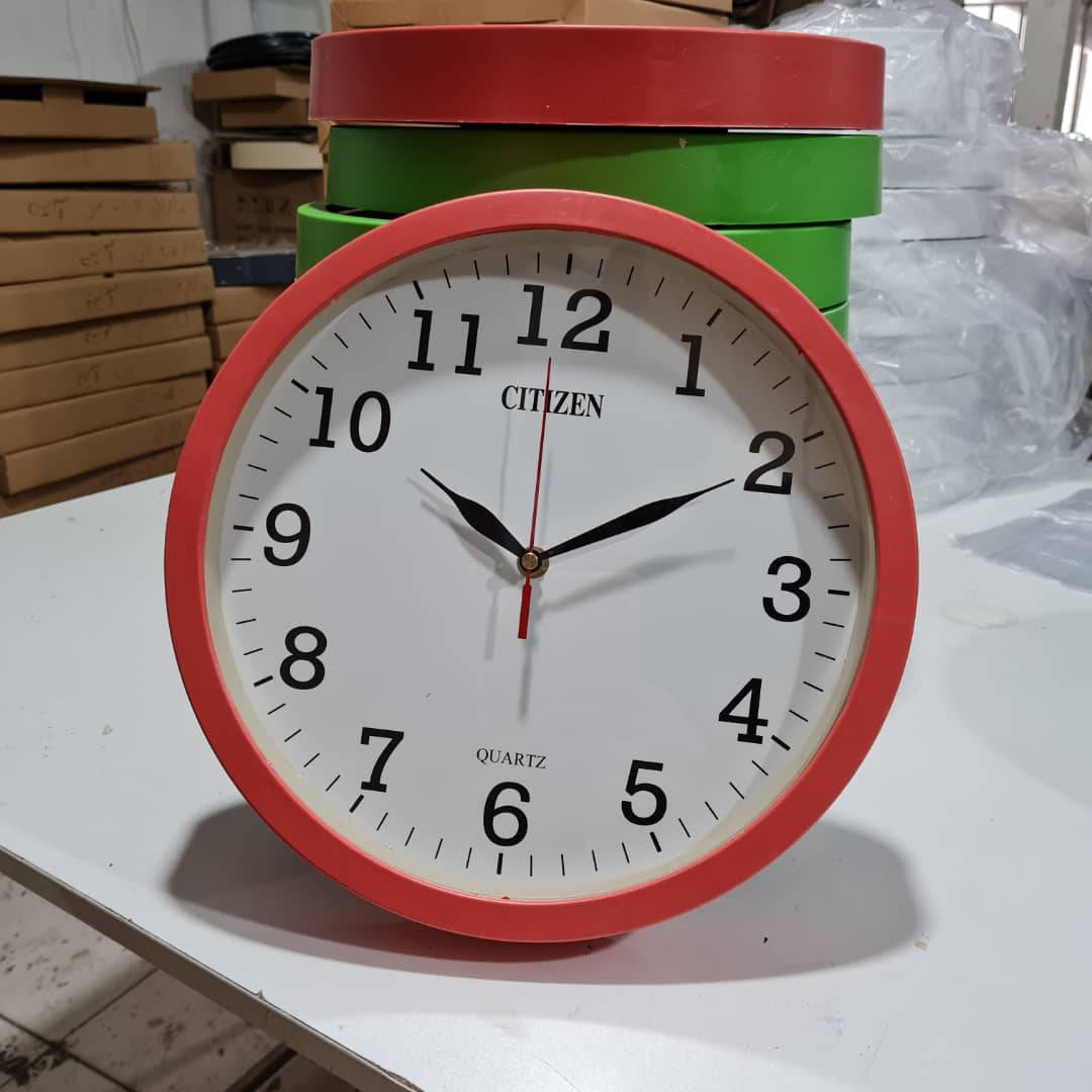 t7B50F06JfcRDBxtEx ساعت دیواری سیتیزن رنگی 32 سانت - Image 1
